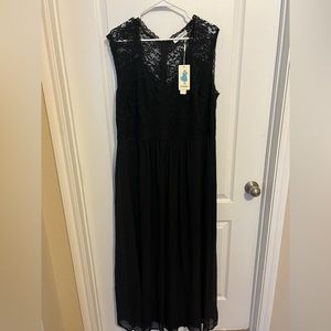Plus size, black, floor length dress.